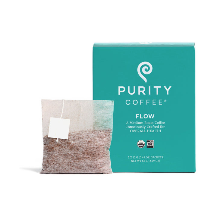 Purity Coffee FLOW Pocket Purity box with single-serve coffee sachet on white background